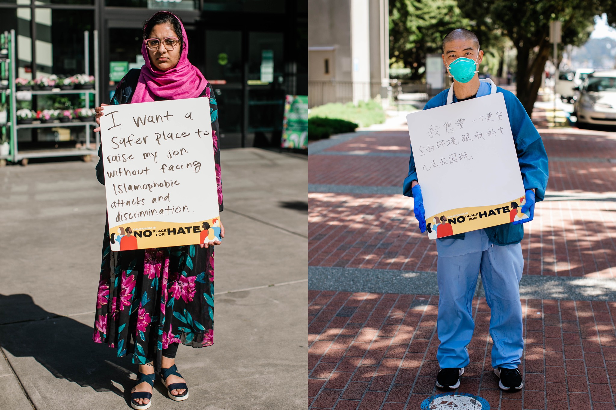 two people holding signs in front of a building.